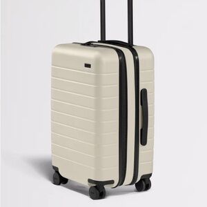 Away carryon suitcase luggage beige